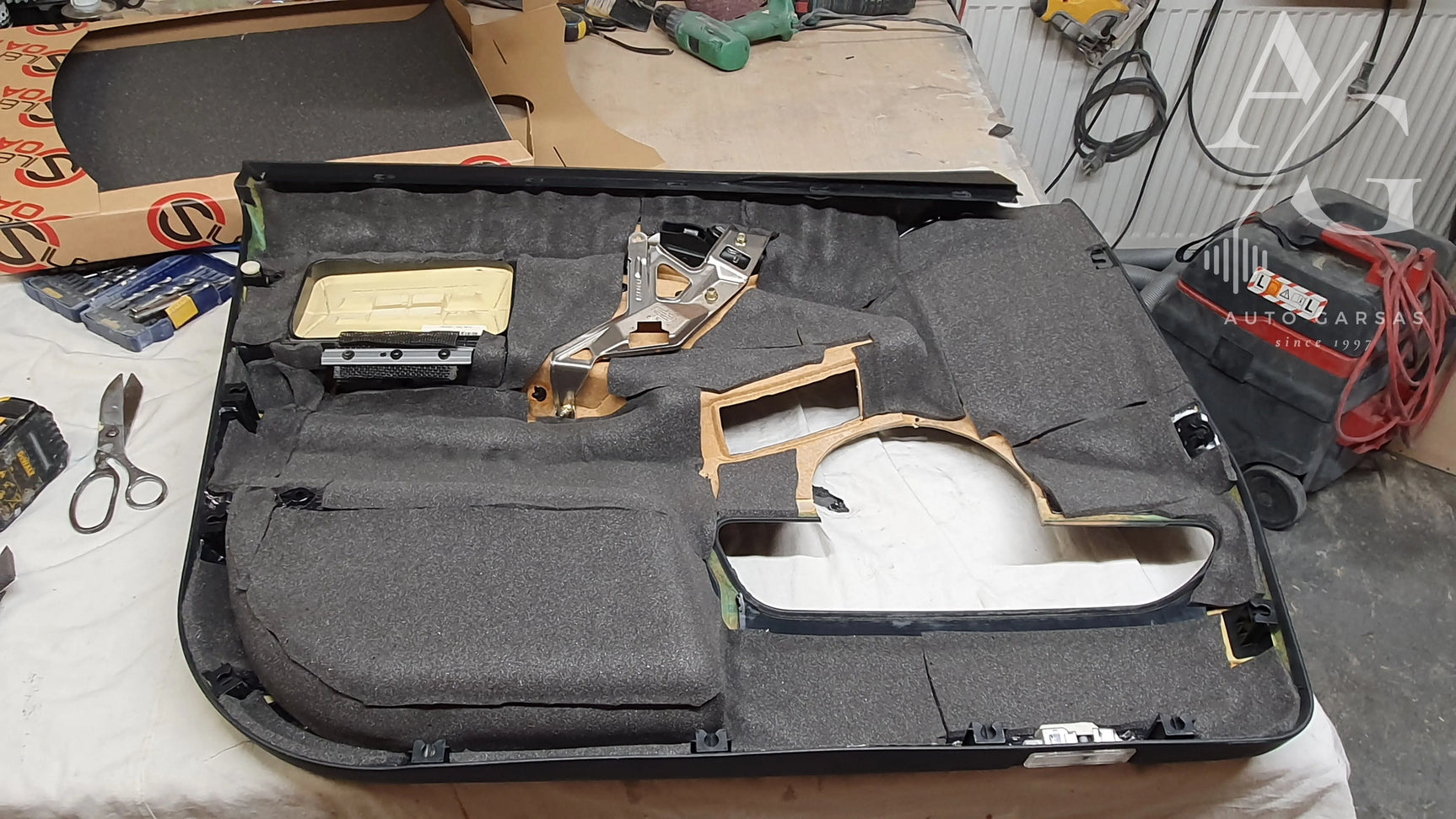 BMW X5, garso aparatūra ir garso izoliacija