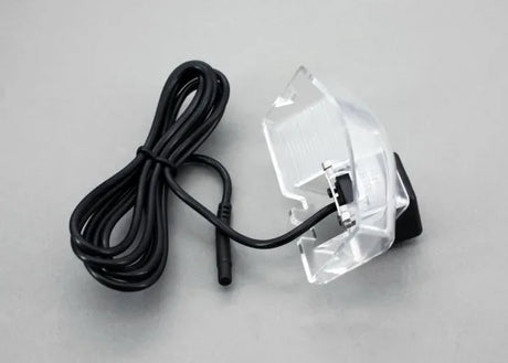 LAMZCM02 galinio vaizdo kamera Mazda 2, Mazda 3 (2010-2013) - Permatomas korpusas su laidu