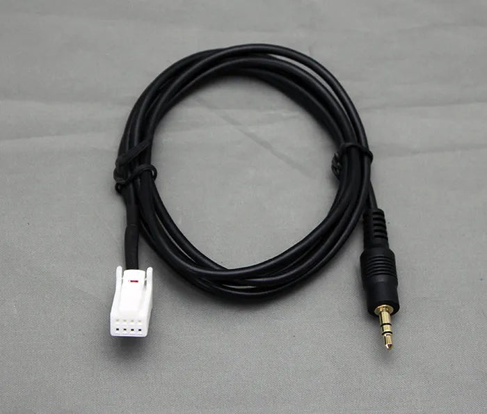 Nissan AUX 3,5mm įėjimo adapteris per CD changer jungtį